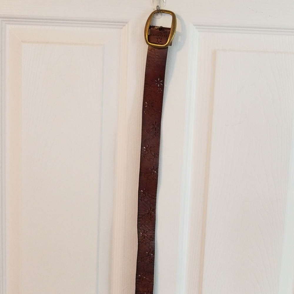 Floral punch leather belt EUC